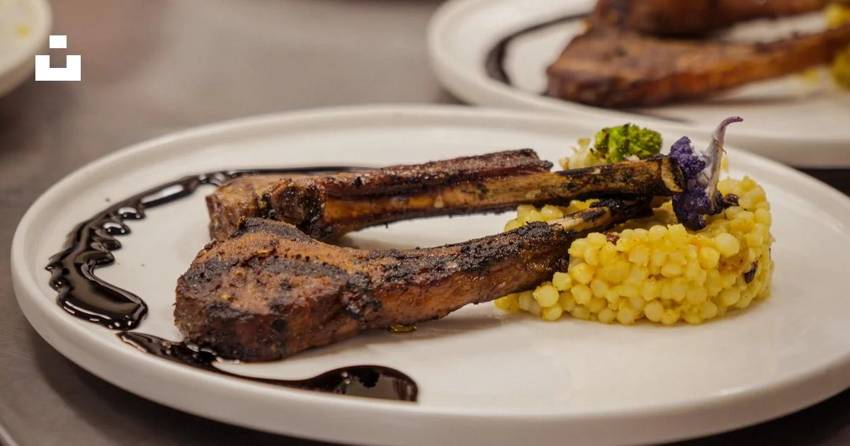 Grilled lamb chops with golden grains, vegetables and sauce